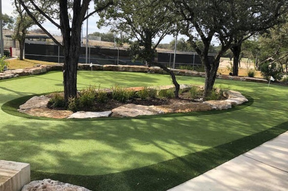 Austin residential backyard putting green grass